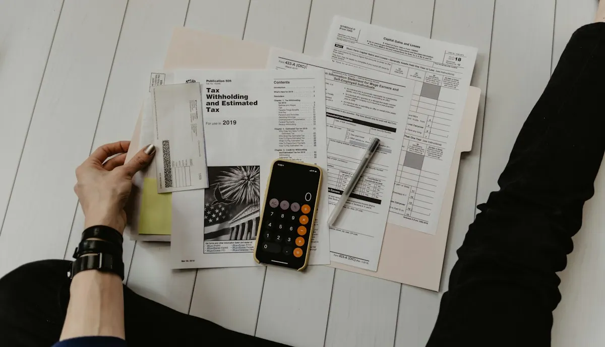 Billing specialist reviewing insurance remittance advice and denied claim forms for appeal