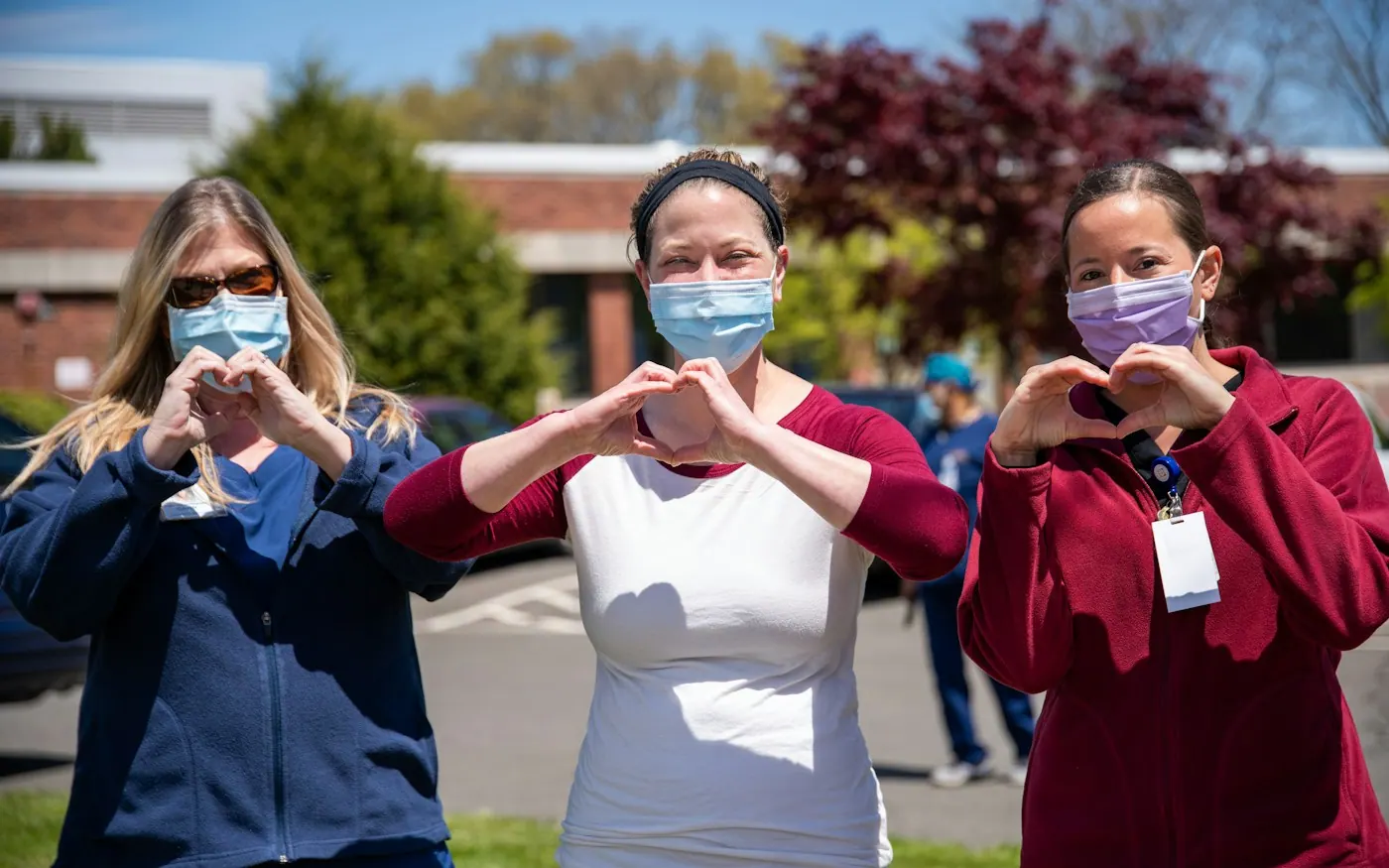 Group of medical staff outside a clinic