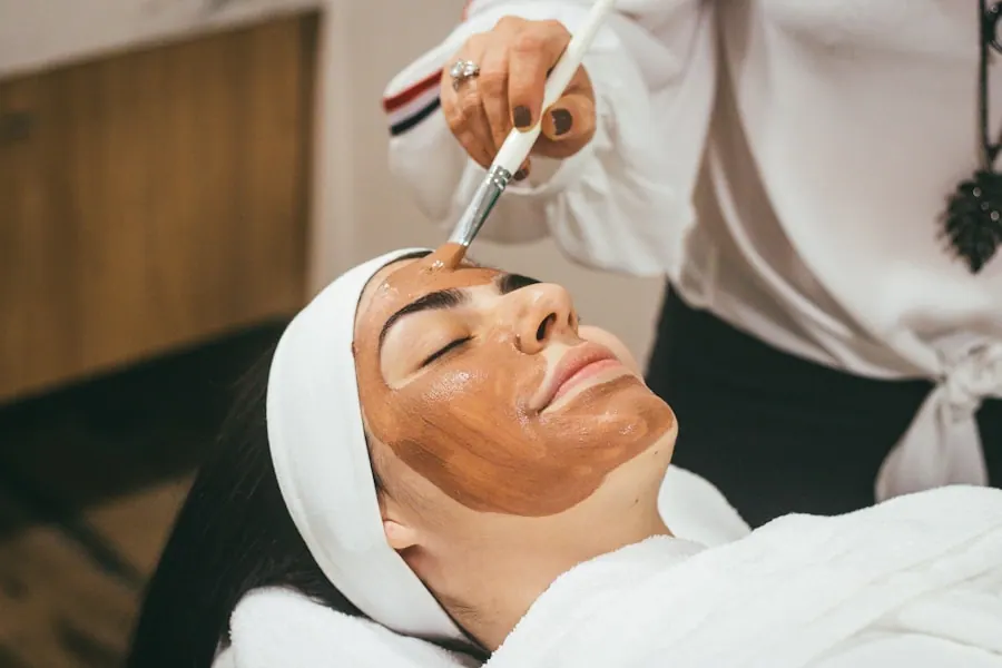 Dermatologist examining a patient's skin with a dermatoscope, dermatology billing services