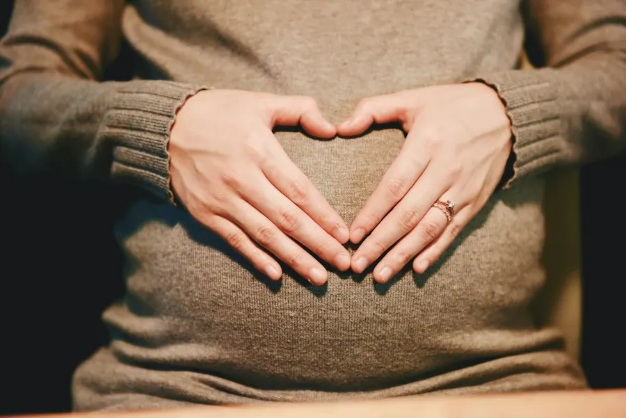 Obstetrician performing a prenatal ultrasound on an expectant mother, OB/GYN billing services