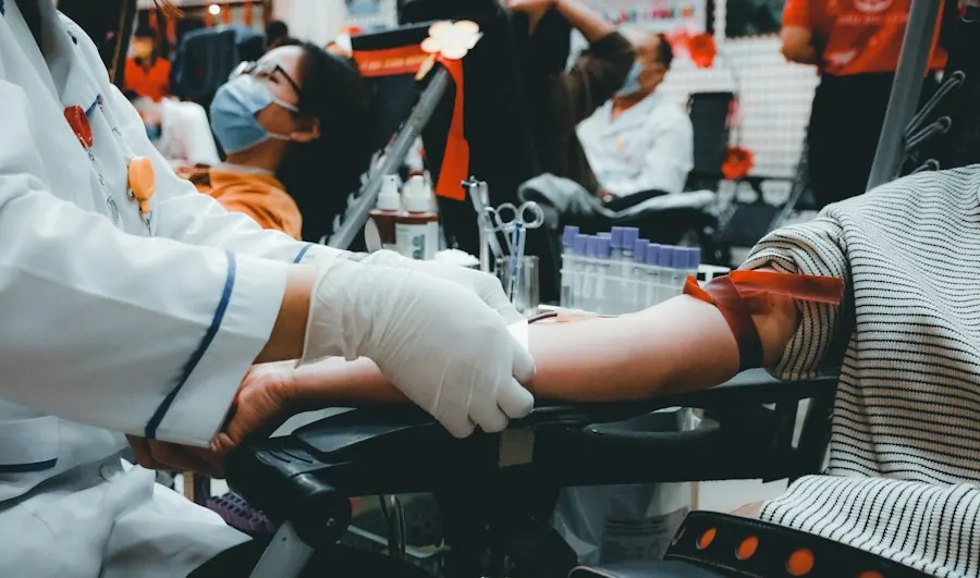 Physician performing a fluoroscopy-guided spinal injection, pain management billing services